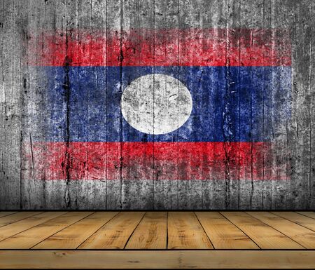 Laos flag painted on background texture gray concrete with wooden floorの写真素材