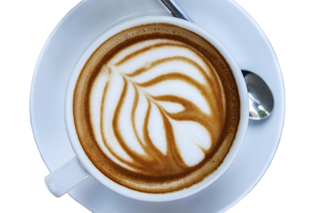 Cup of freshly made espresso in coffee shop on light brown wood boardの写真素材