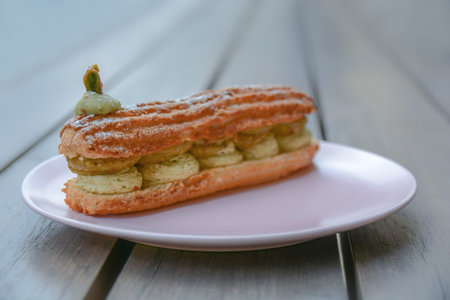 Fresh delicious tasty pistchio Paris Brest creamy pastery tradicional cake