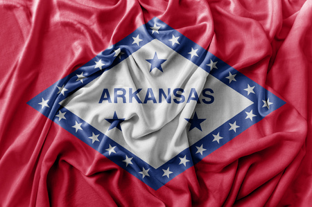 Ruffled waving United States Arkansas flagの写真素材