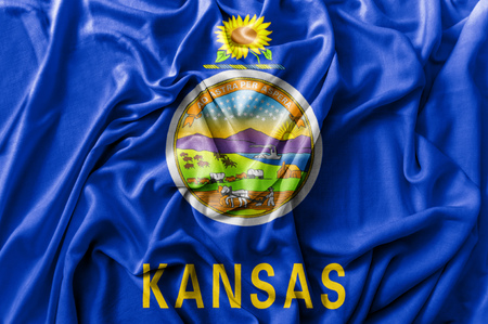 Ruffled waving United States Kansas flagの写真素材