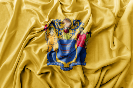 Ruffled waving United States New Jersey flagの写真素材