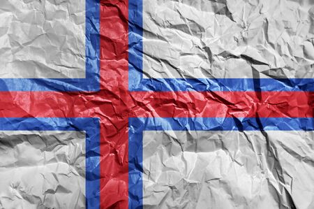 Faroe Islands flag painted on crumpled paper backgroundの写真素材