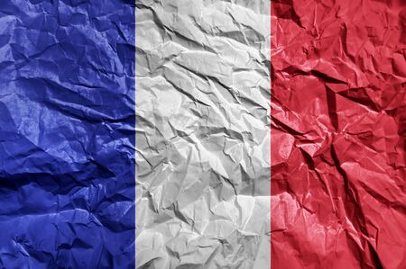 France flag painted on crumpled paper backgroundの写真素材
