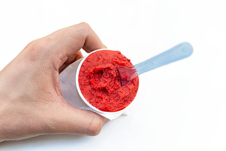 Neapolitan ice cream scoops in white cups