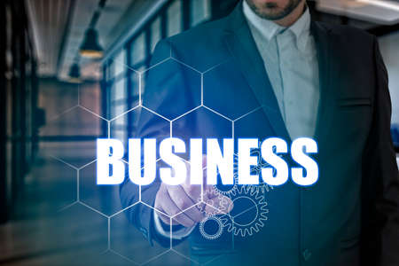 Businessman hand touching BUSINESS point, network connectionの写真素材