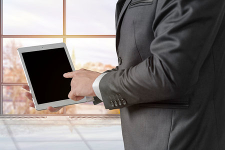 Businessman working with digital tablet computer in the office