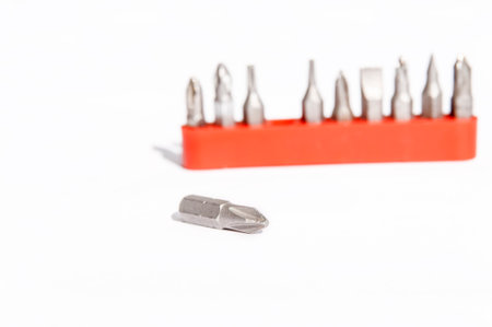 Chrome industrial screwdriver set with various bits and one bit extension and replaceable headの写真素材
