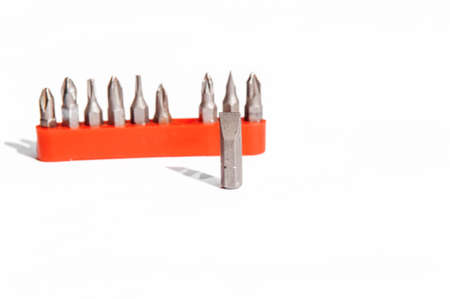 Chrome industrial screwdriver set with various bits and one bit extension and replaceable headの写真素材