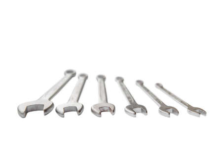 Row of mechanic silver metal tool wrench for repair isolated on whiteの写真素材