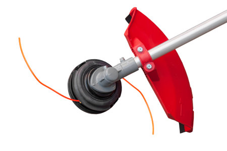 Lawnmower big head trimmer for grass like garden machine on whiteの写真素材