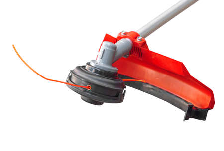 Lawnmower big head trimmer red for grass like garden machine on whiteの写真素材