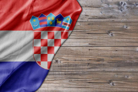Wooden pattern old nature table board with Croatia flagの写真素材