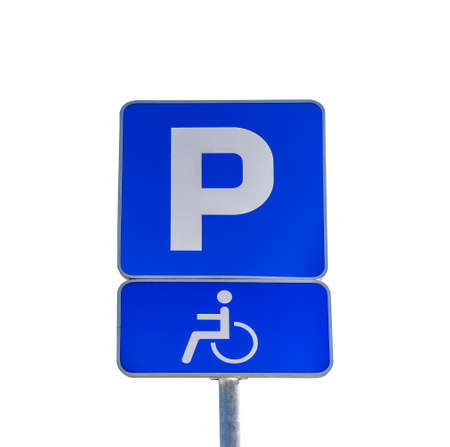Big blue P sign for parking and parking sign for persons with disabilities isolated on whiteの写真素材