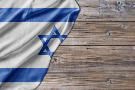 Wooden pattern old nature table board with Israel flagの写真素材