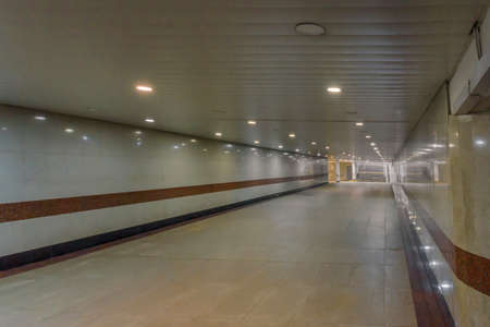 Empty underground passenger metro tunnelの写真素材