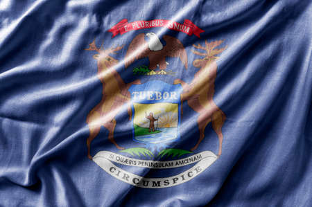 Waving detailed national US country state flag of Michiganの写真素材