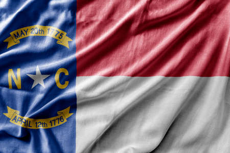 Waving detailed national US country state flag of North Carolinaの写真素材