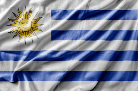 Waving detailed national country flag of Uruguayの写真素材
