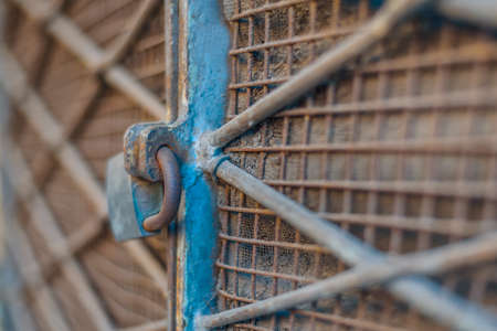 Old padlock window with a rusty iron windowの写真素材