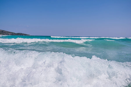 Big sea water wave with clean blue skyの写真素材