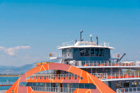 KAVALA, GREECE - AUGUST 21 2018 Deck on Ferry docked at marina with blue skyのeditorial素材