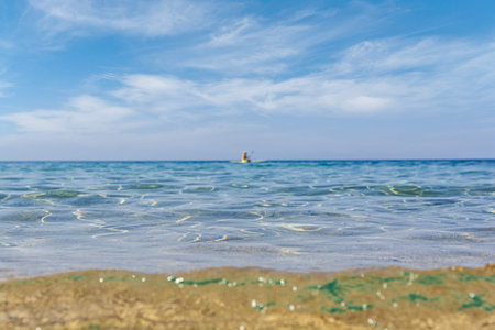 Sea foreground with water and cloudy sky