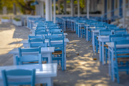 Table And Chairs In A Typical Tavern in Greeceの写真素材