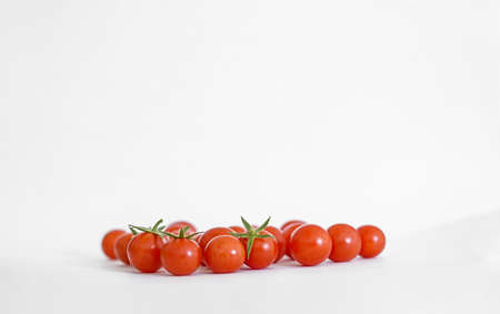 Tasty fresh red cherry tomato, vegetarian organic nutritionの写真素材