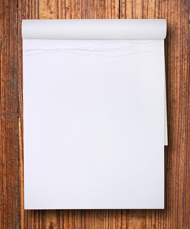 white blank paper tablet on wood の写真素材