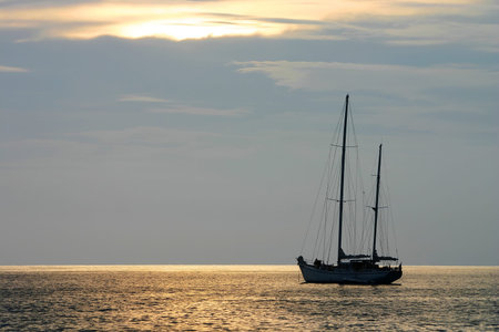 sailing boat, sunset, kata beach, thailand 
