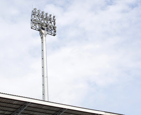 a football stadium floodlight with metal pole 