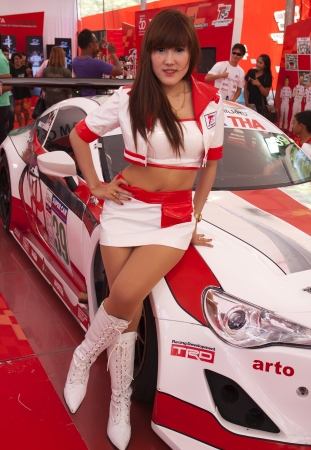 PHUKET, THAILAND - JULY 22: unidentified model with Toyota 86 sport car at Toyota Motorsport 2012. on july 22, 2012 in Phuket Thailandのeditorial素材