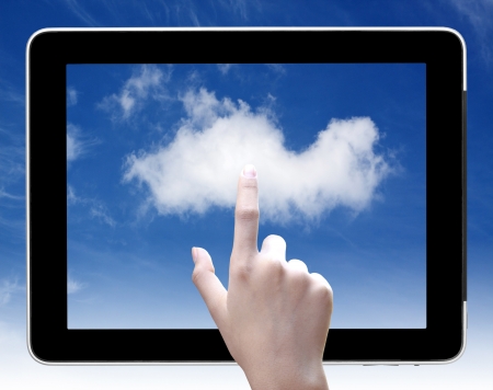 hand touch  cloud on tablet pc, concept of cloud computing の写真素材