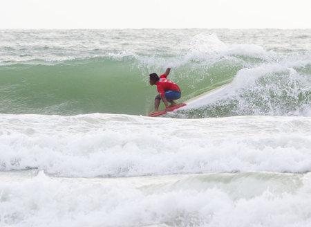 PHUKET, THAILAND - SEPTEMBER 15  unidentified  surfer races the Quiksilver Open Phuket Thailand on...
