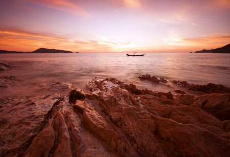  boat alone in sea twilight phuket thailandの写真素材