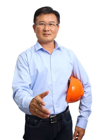 Portrait of an handsome engineer giving the hand shake isolated on whiteの写真素材