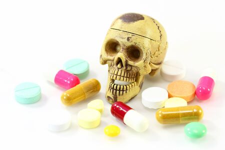 skeleton with drug on white background over dose concept.の写真素材