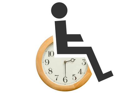 Widely recognized disability symbol place on a clock, white background, concept of devoting time to help people who are disabled. .の写真素材
