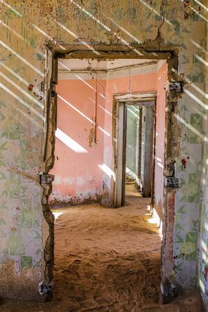 The interior of a house in Kolmanskop, a ghost town in the area of the diamond mines, Namibia.の写真素材