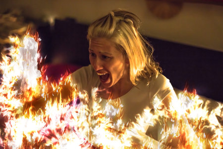 Woman in home on fire, screaming in flames.