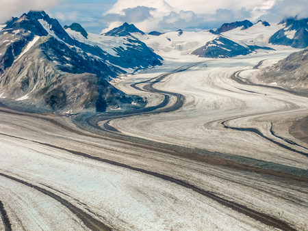 View from the flight. Glacier in the mountains of Denali National Park, Alaska, America, USA. .の写真素材