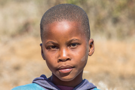 Portrait of a poor South African child on the road leading to UMkhuze Game Reserve, South Africa.のeditorial素材