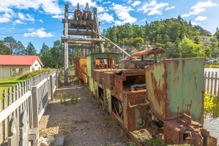 Queenstown, Tasmania, Australia - January 10, 2015: historical artifacts: electric locomotive English Electric 2 ft gauge from Mount Lyell Mining Company who ran copper extraction from Mt Lyell minesのeditorial素材