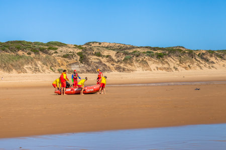 Phillip Island, Victoria, Australia - January 4, 2015: Baywatch prepare to go out to sea with the lifeboat in Woolamai Surf Life Saving Club, Cape Woolamai State Faunal Reserveのeditorial素材