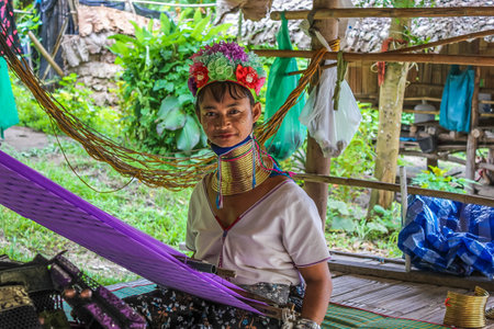 Chiang Rai, Thailand - July 25, 2011: A long neck woman Karen, Padaung tribeのeditorial素材