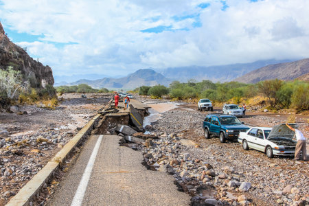 Nopolo, Baja, Baja California Sur, Mexico - August 25, 2013: Collapsed highway linking La Paz to Loreto during the tropical storm named Julietteのeditorial素材