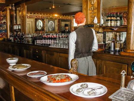 Skagway, Alaska, United States - August 7, 2009: The Mascot Saloon, an authentic restoration of the ancient Skagway. People statues made in wax.のeditorial素材