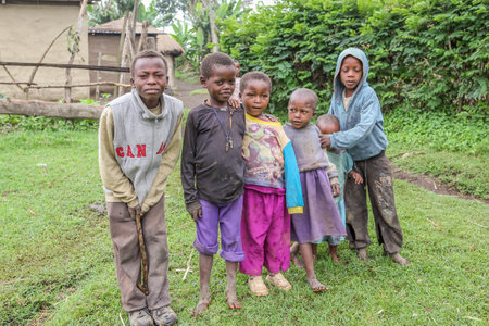 Arusha, Tanzania.- January 2, 2013: Poor children of Ilkidinga, Waarusha Masai village on the slopes of Mount Meruのeditorial素材