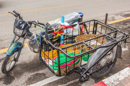 Chiang Mai, Thailand - July 23, 2011: Thai bike parked on the street in  town.のeditorial素材